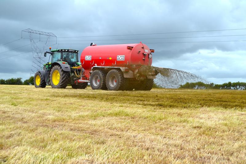 Tractor spreading slurry