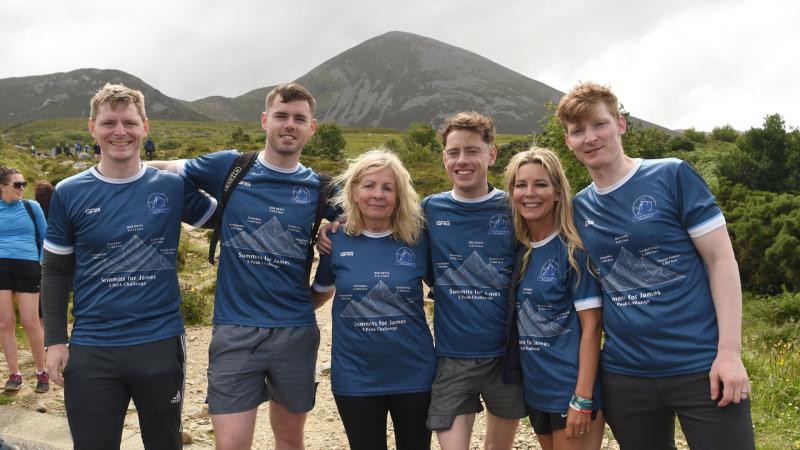 Hundreds climb Croagh Patrick in honour of Aughamore’s James McNeive