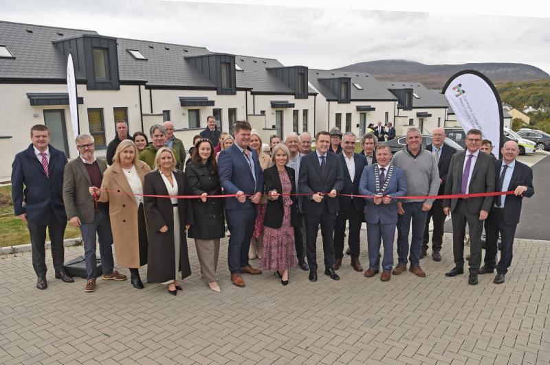 Minister for Housing James Browne cuts the ribbon on the new housing development in Mulranny
