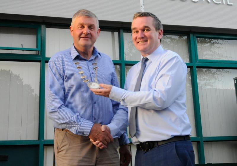 Holmes back in the hot seat in the West Mayo District