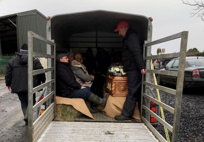 Crossing the fields to her final resting place