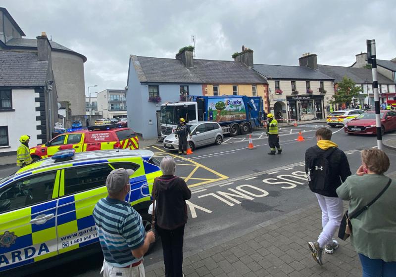 Runaway bin lorry ploughs into cars