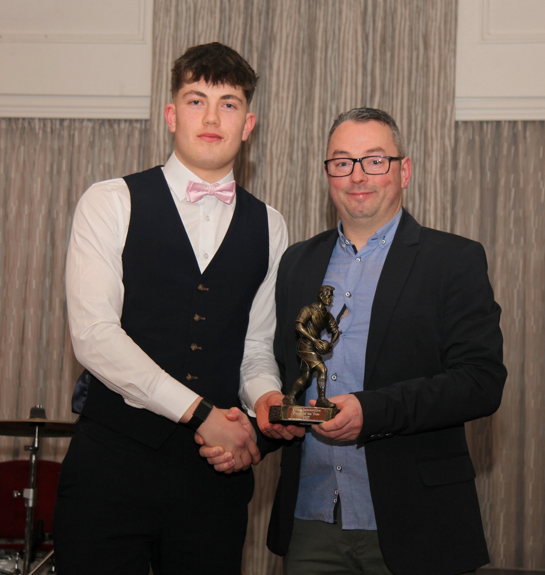Young Intermediate Player of the Year 2025 Rossa Burke, receiving the award from Ruairi Keane, Intermediate management.
