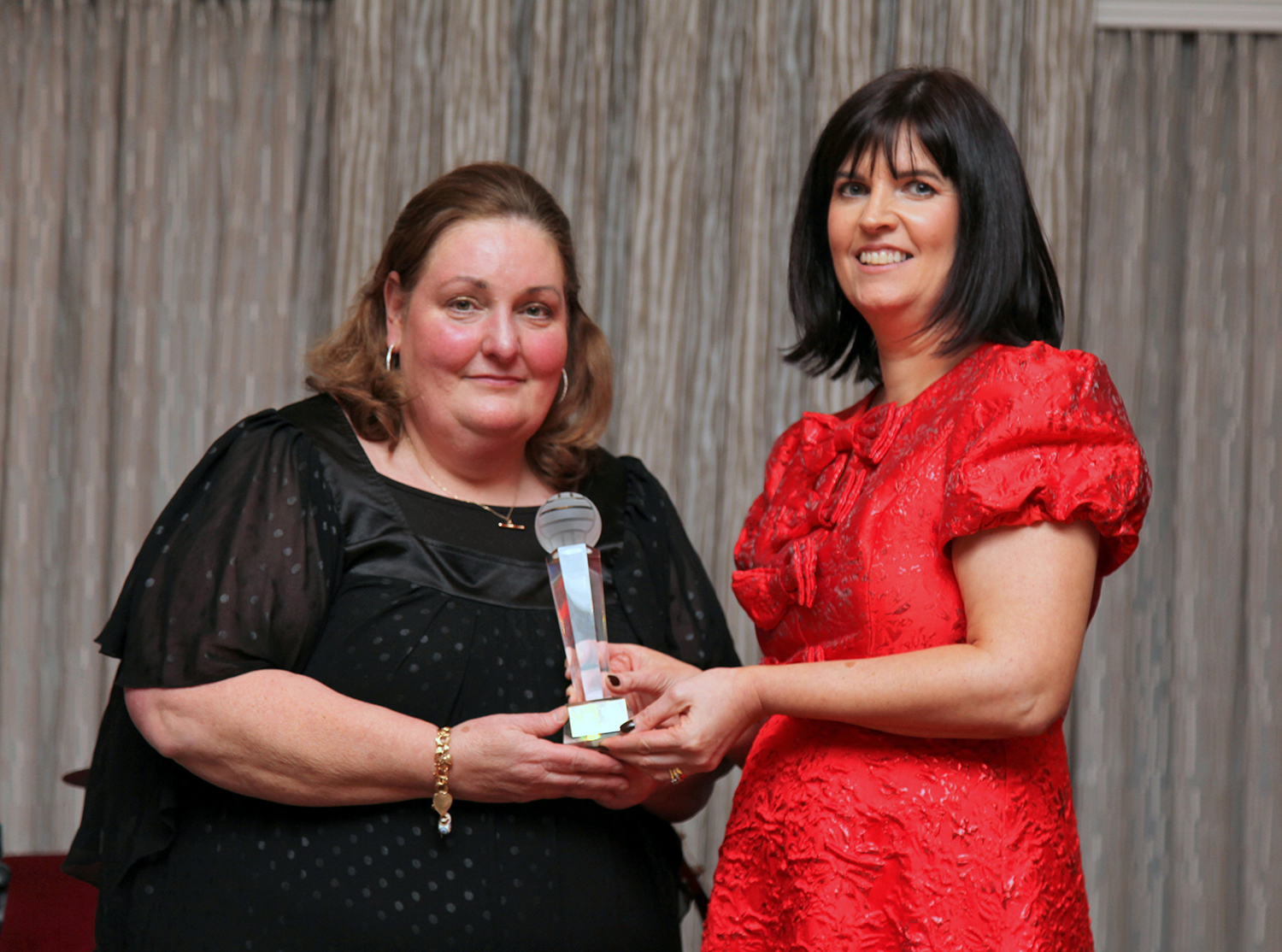 Club Person of the Year 2025 Mary Langan receiving the award from Annette Conway, Chairperson, Ballinrobe GAA.